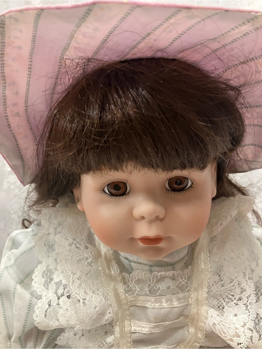 Vintage Porcelain Doll with Pink Bonnet